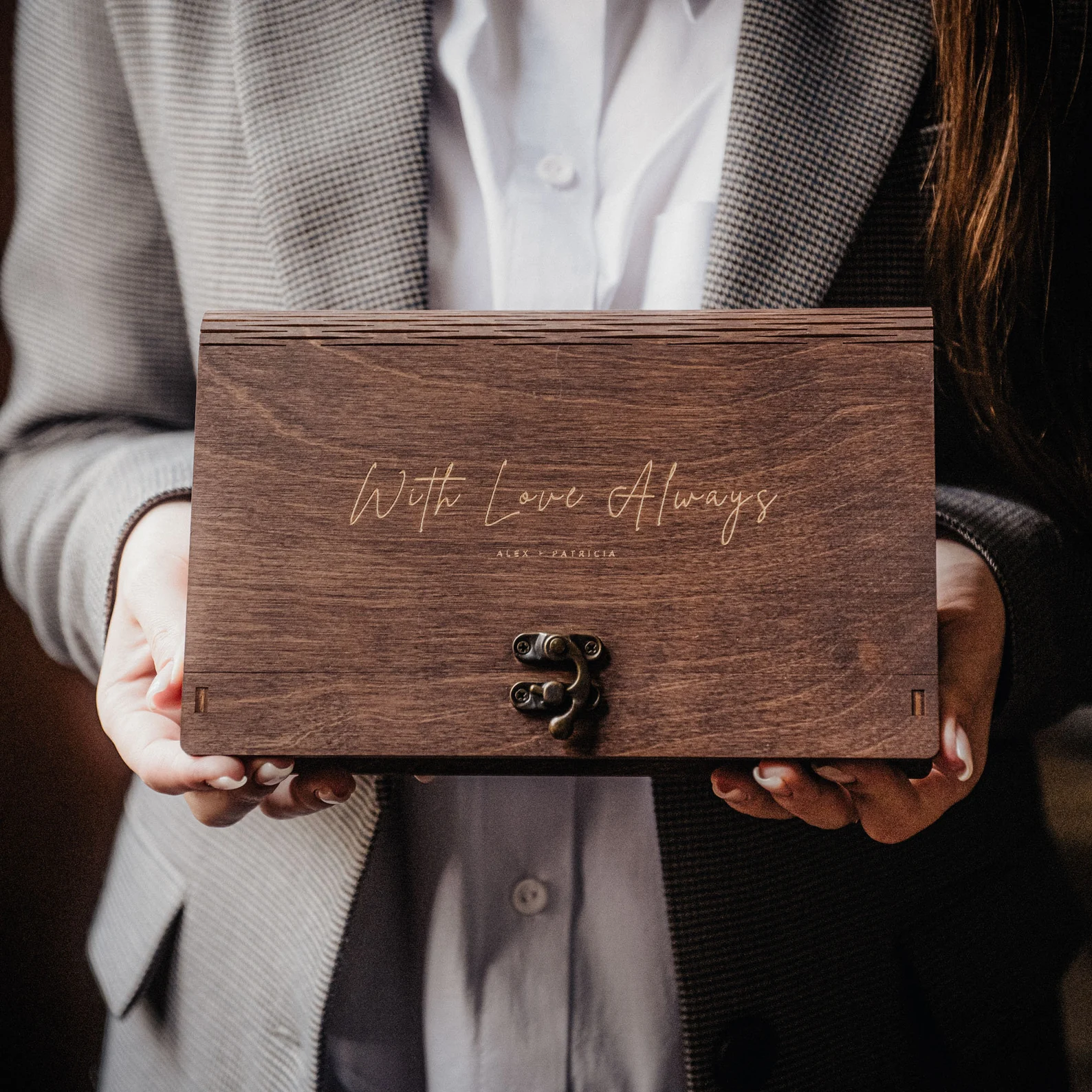 Hands holding a keepsake box